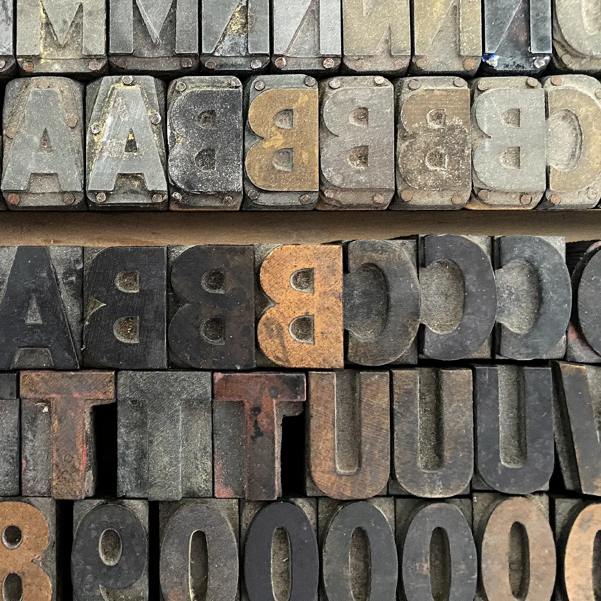 A close up of large capital letter type and numbers.