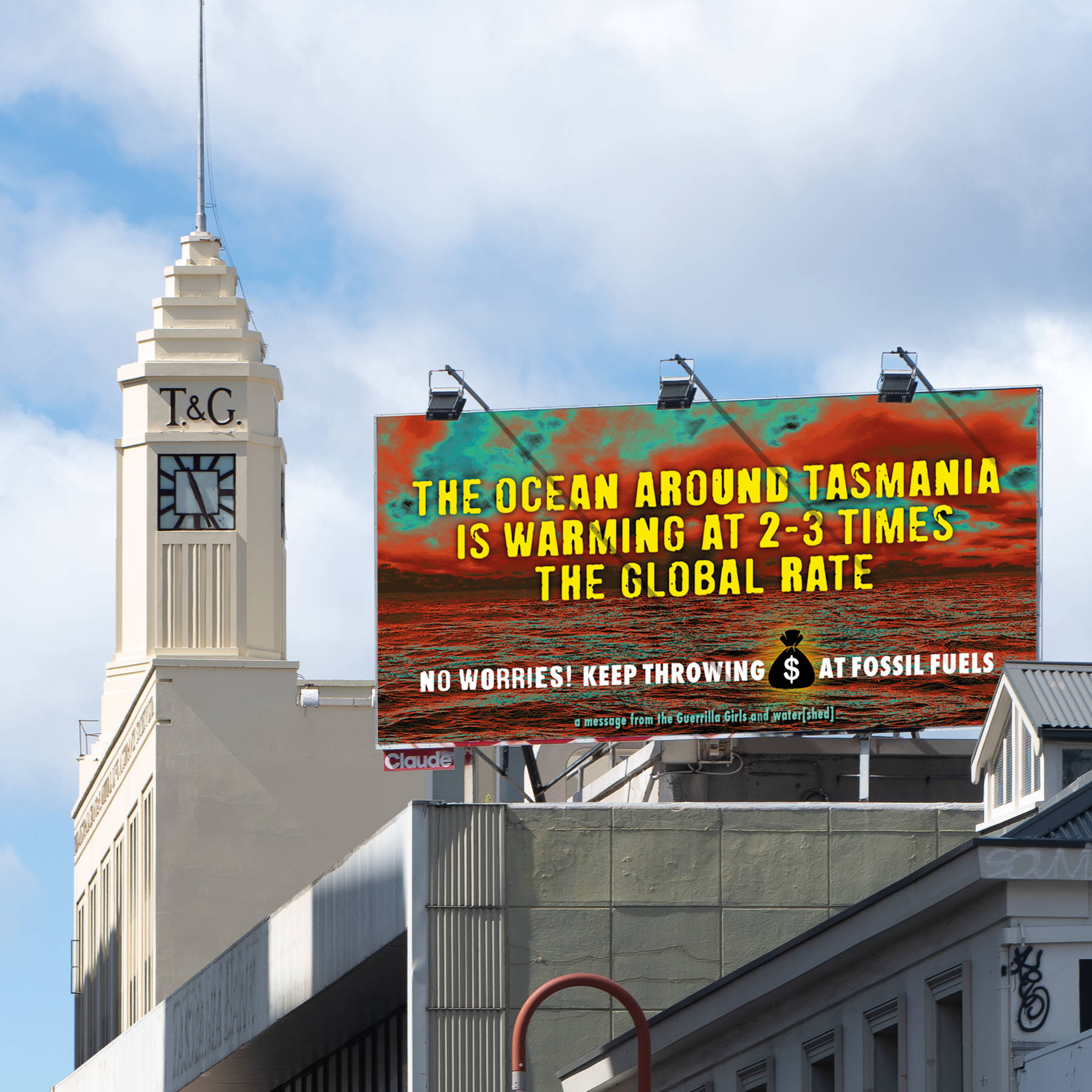 Billboard above a building in Murray Street in Hobart’s CBD that reads ‘The ocean around Tasmania is warming at 2–3 times the global rate. No worries! Keep throwing $ at fossil fuels. A message from the Guerrilla Girls and water[shed].’