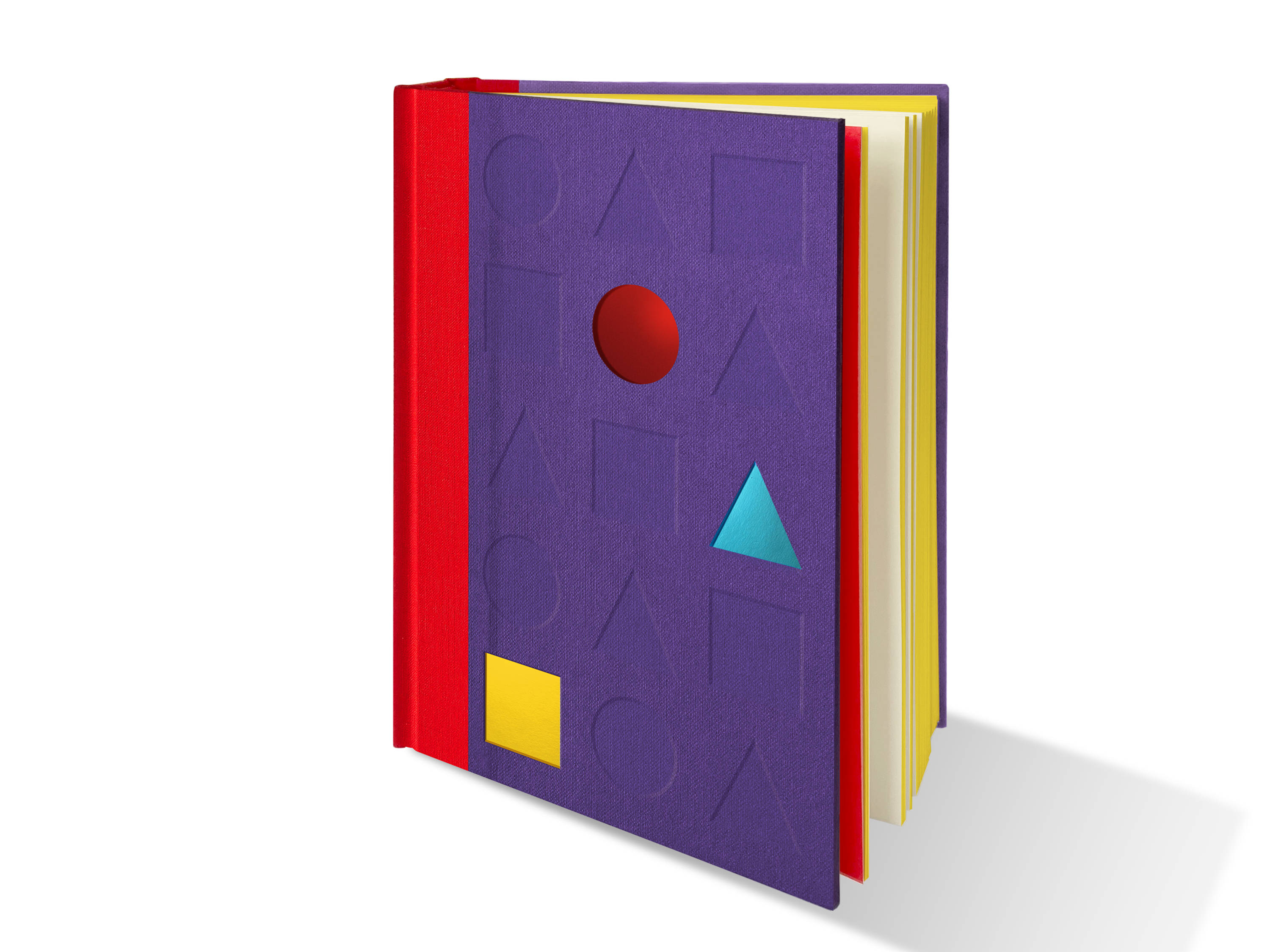 An image of the Repeat Pattern book, showing the book standing up and partly open. The cover has a purple coloured hard case with a yellow foil square, an aqua blue foil triangle and a die-cut red hole. The spine of the book is bound with red linen and the exposed edges of the pages are yellow gilded. 